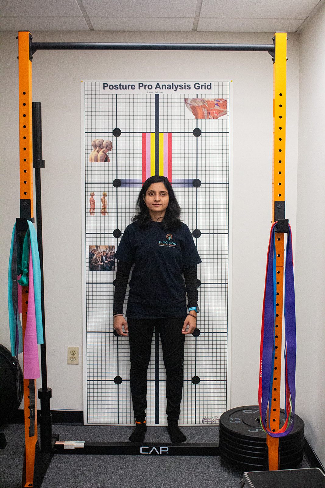 Dr. Foram Patel demonstrating a posture assessment